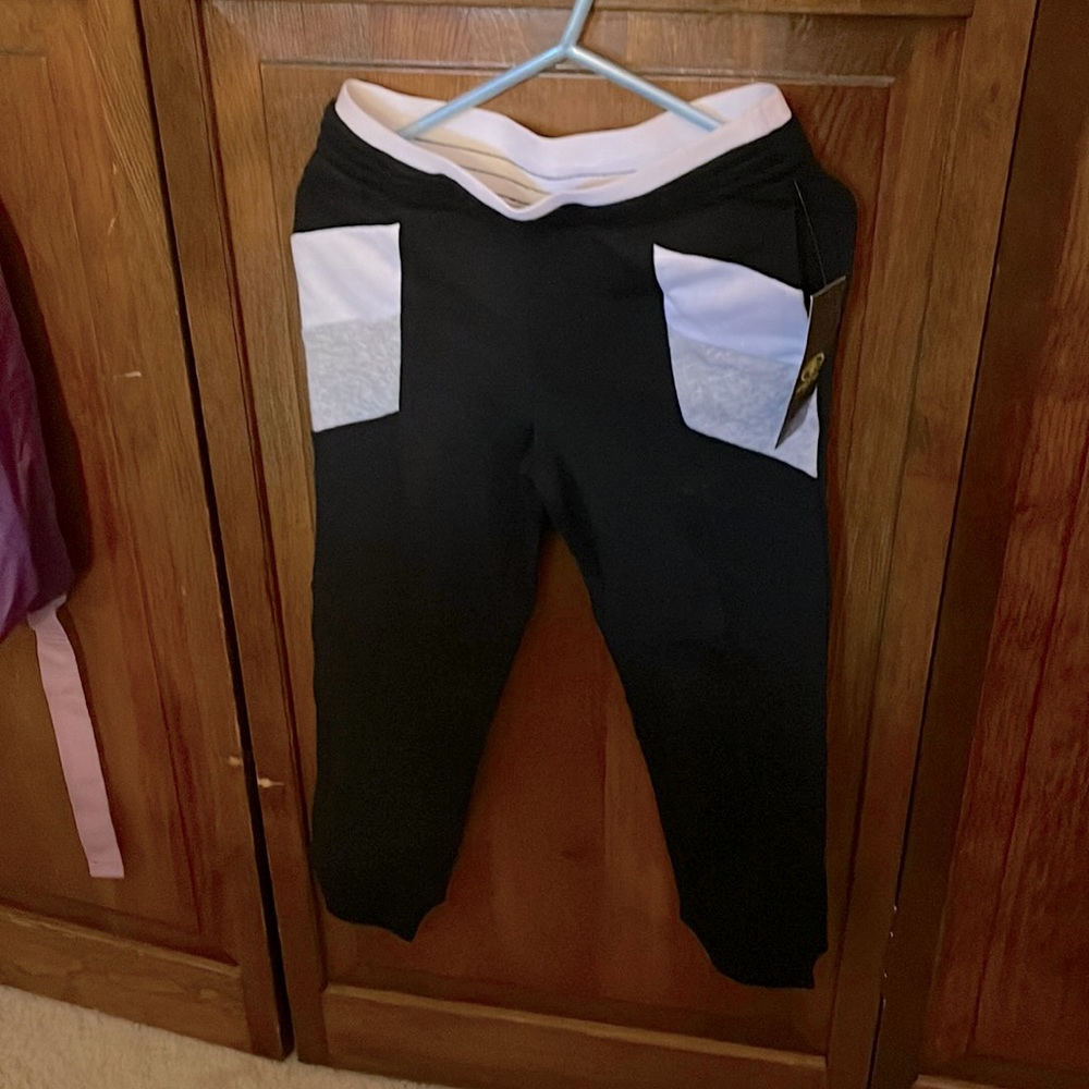 Black with gray and white front pockets
